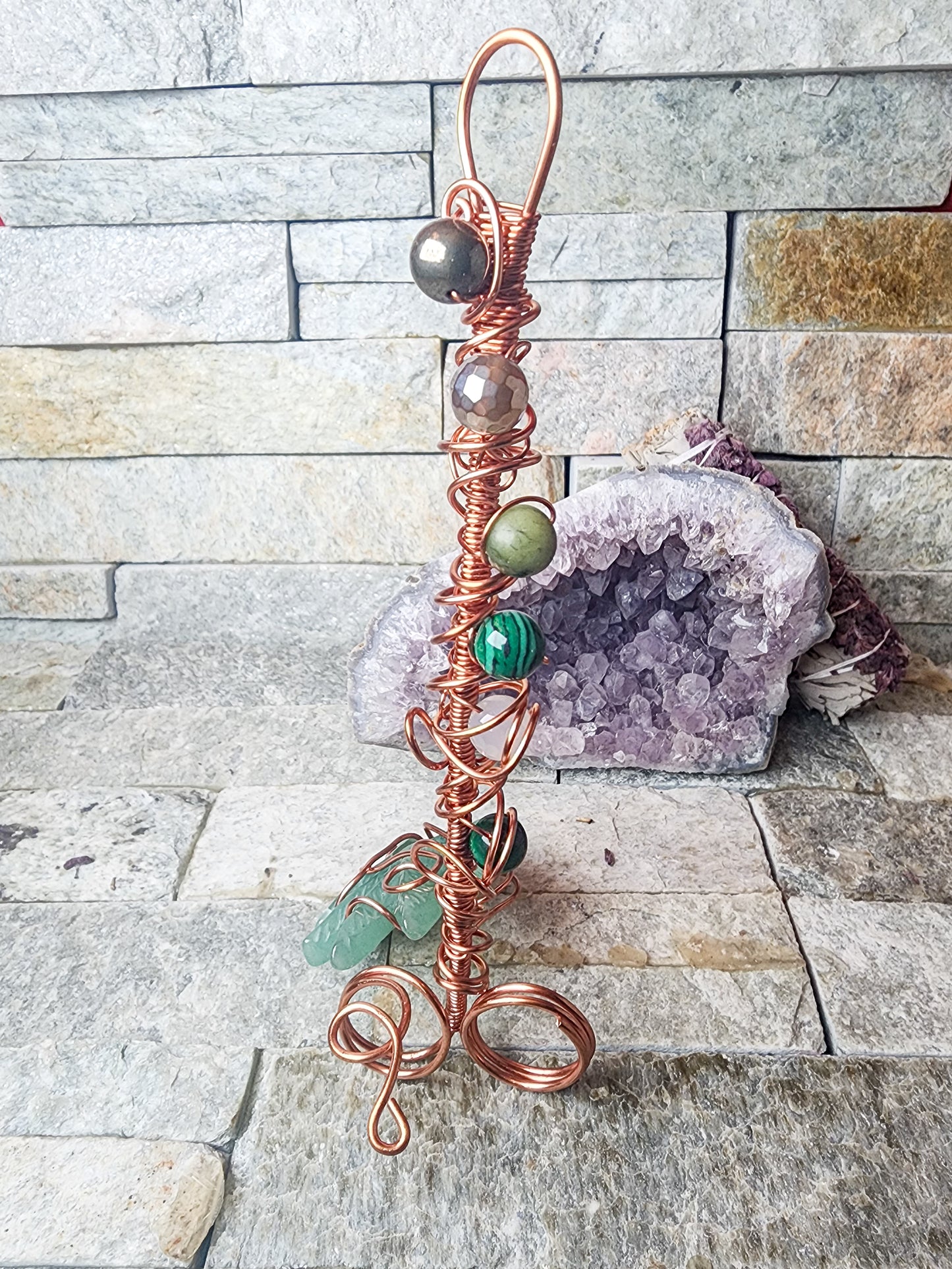 Coiled Crystal Luxe: Bespoke Rings Infused with Pyrite, Malachite & More