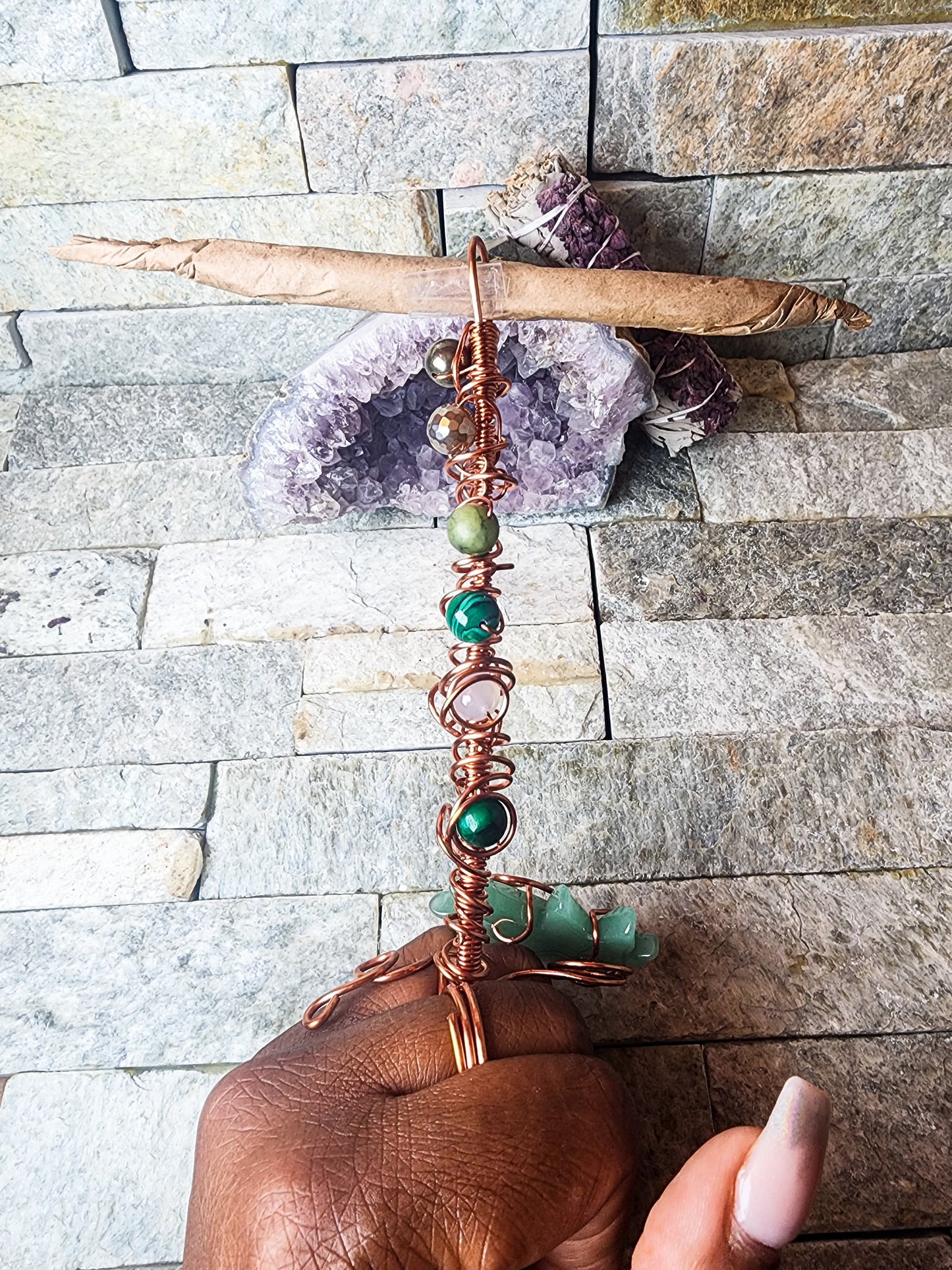 Coiled Crystal Luxe: Bespoke Rings Infused with Pyrite, Malachite & More