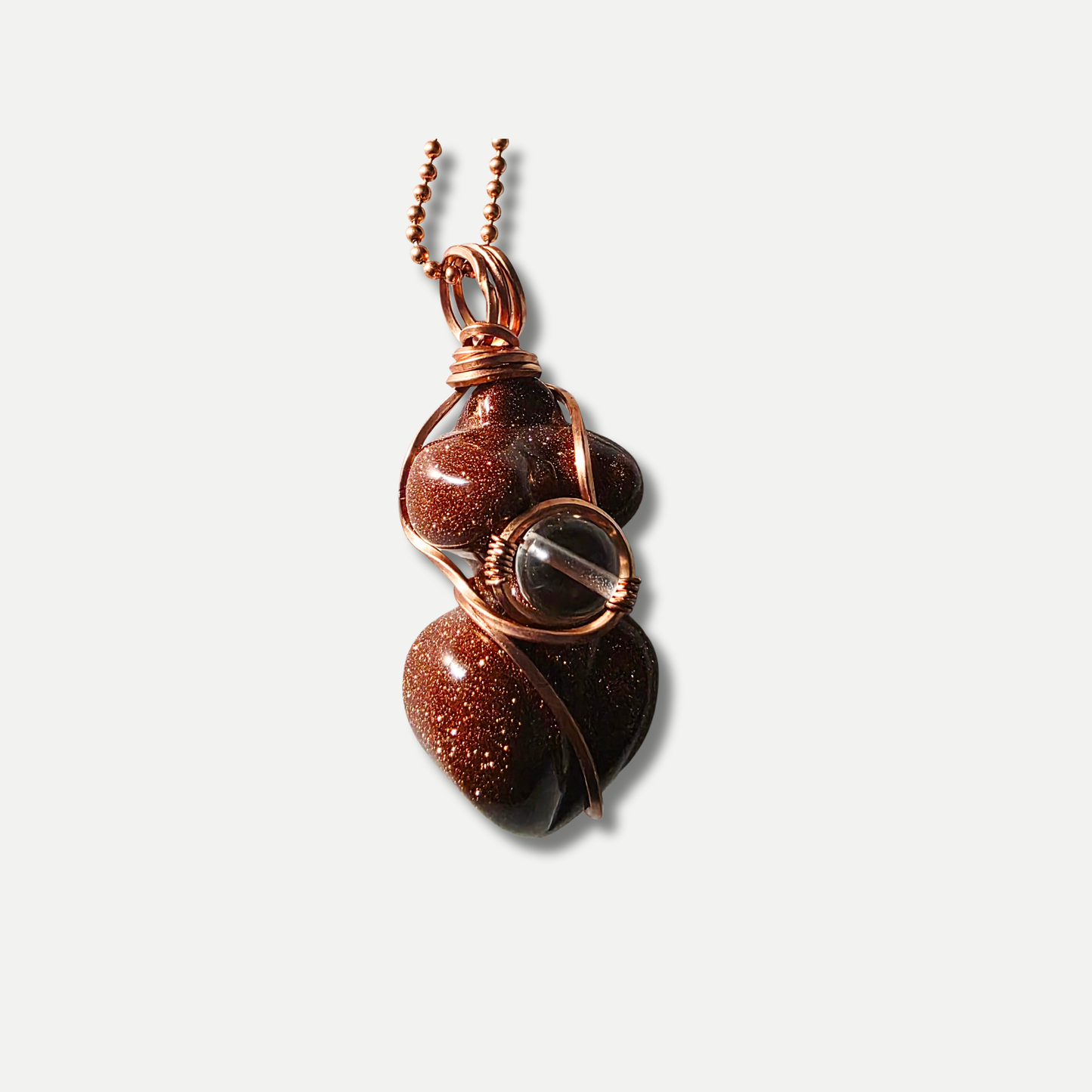 Goldstone pendant necklace with glittering copper flecks – JvOR. Close up view