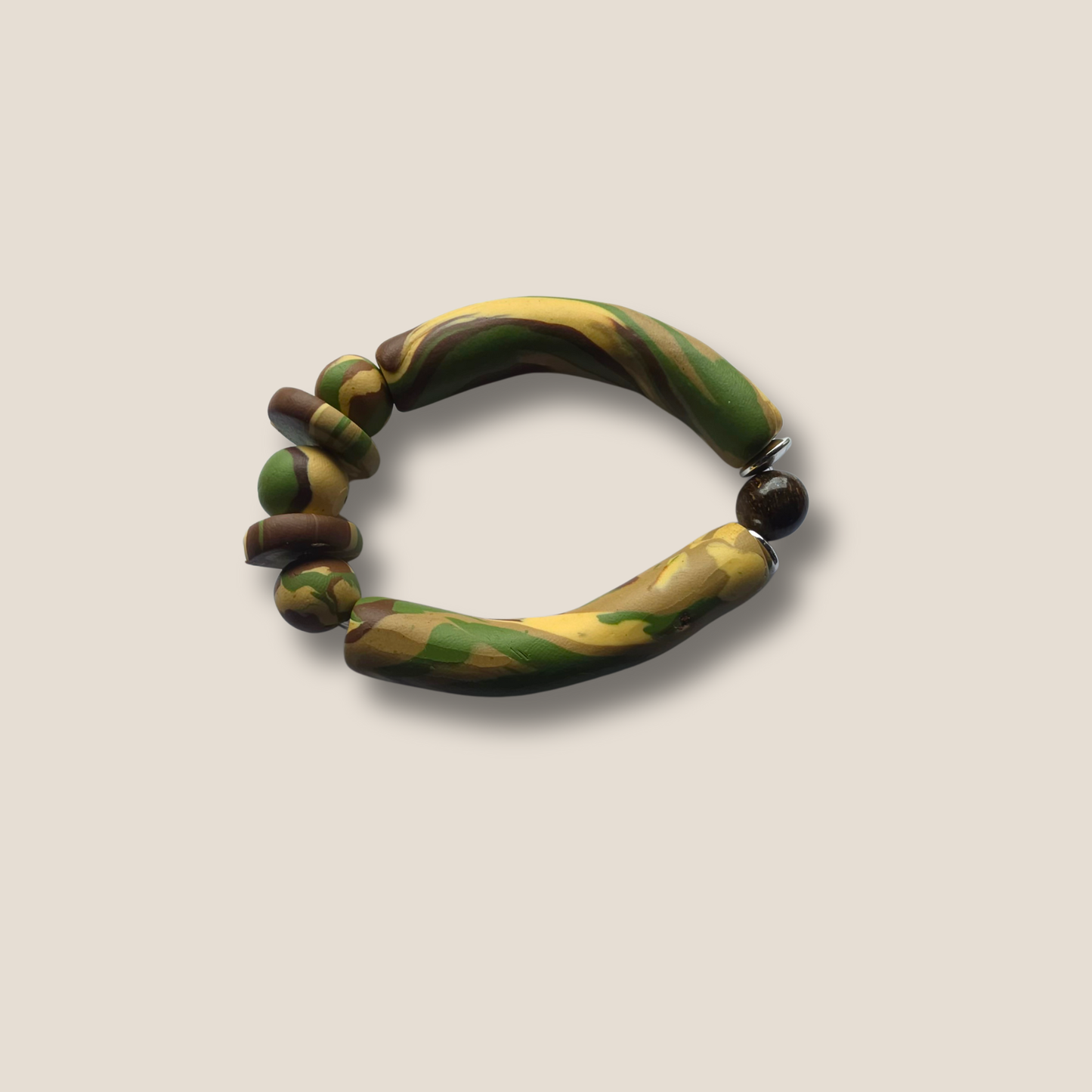JvOR Ivory Ops handmade ivory polymer clay bracelet with Bronzite accent bead — unisex grounding jewelry from The Stealth Collection.