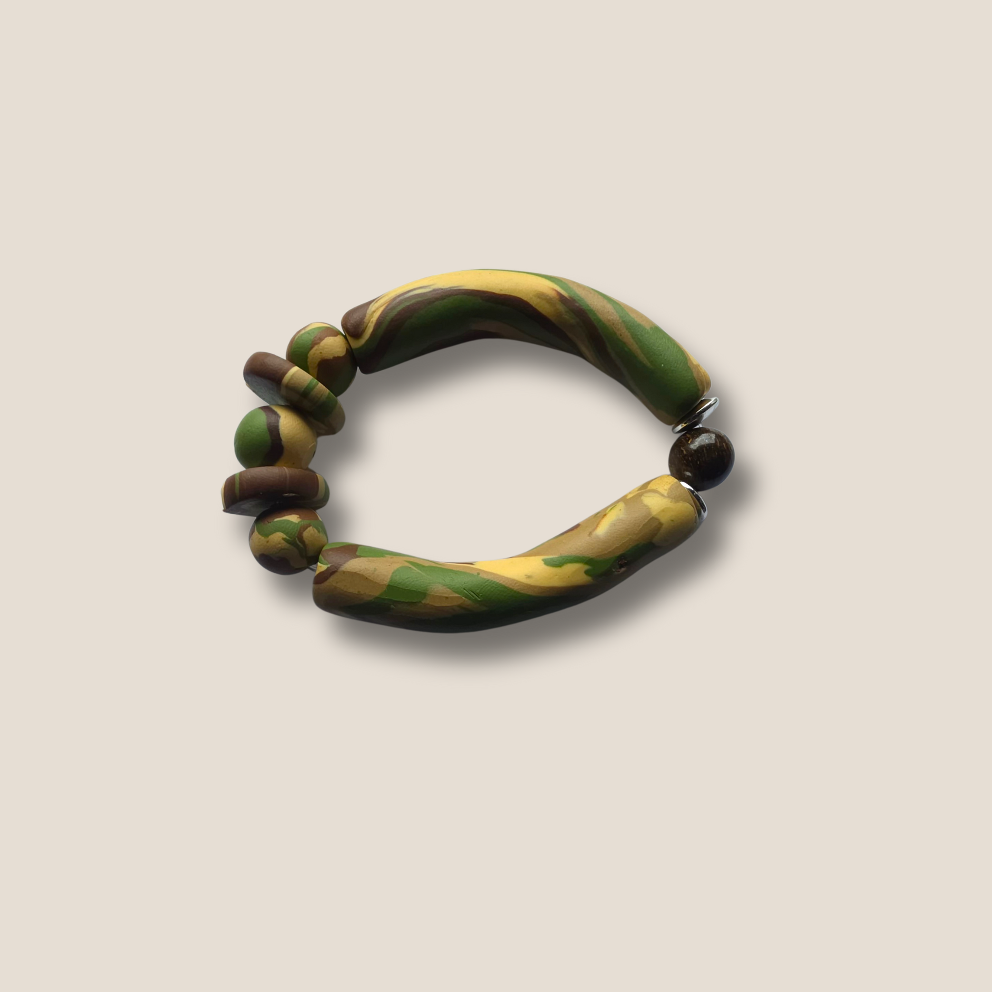 JvOR Ivory Ops handmade ivory polymer clay bracelet with Bronzite accent bead — unisex grounding jewelry from The Stealth Collection.
