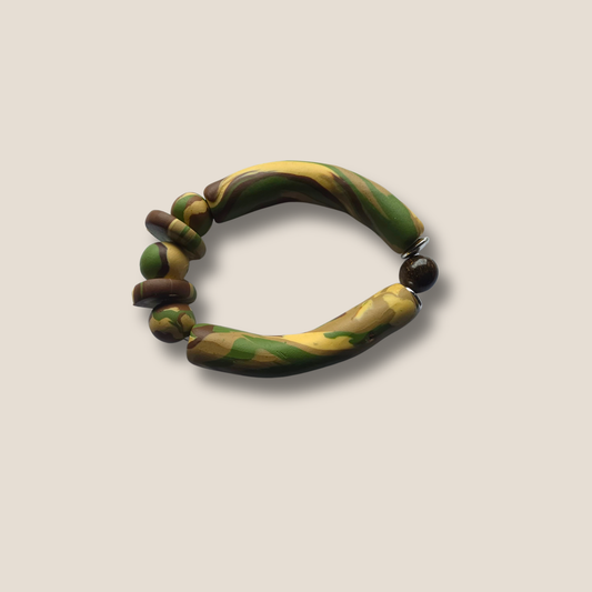JvOR Ivory Ops handmade ivory polymer clay bracelet with Bronzite accent bead — unisex grounding jewelry from The Stealth Collection.