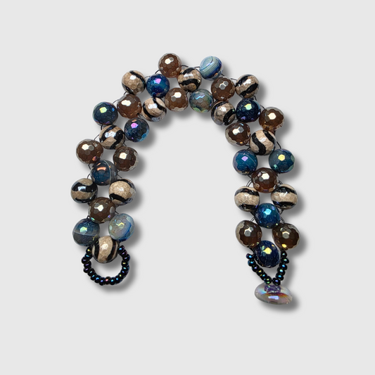 Agate and stripped Tibetan agate beaded bracelet sewn with needle and thread, featuring a cup button clasp and seed beads — handcrafted by JvOR