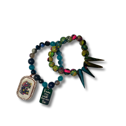 Handcrafted bracelet blending authentic crystals and polymer clay beads, designed for powerful energy and bold style