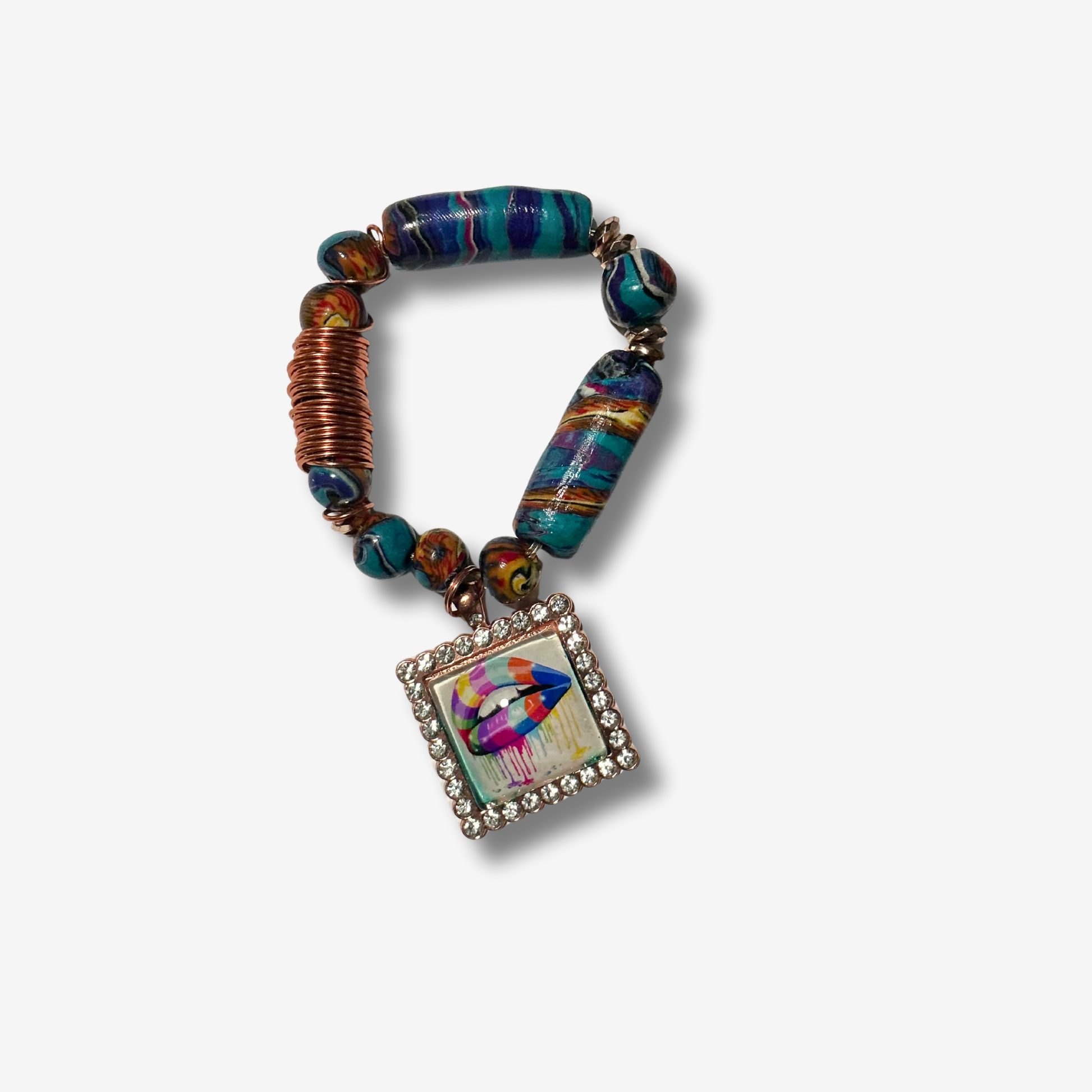 Bold handmade polymer clay bracelet with vibrant colors, featuring statement beads and some designs with spiked accents, AND ROSES.