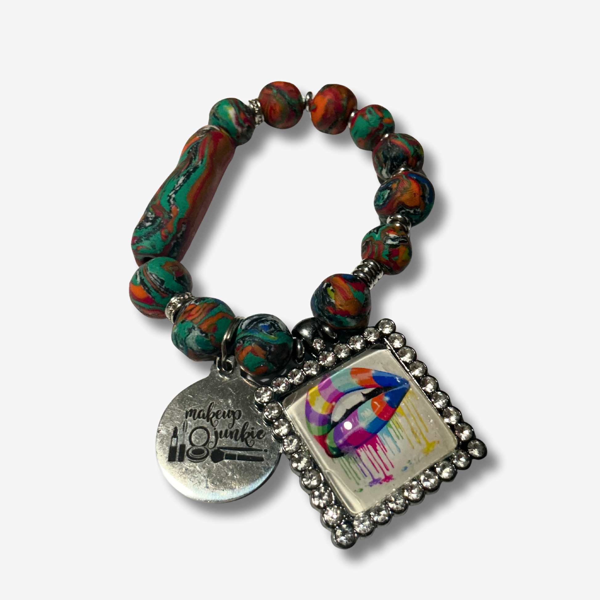 Bold handmade polymer clay bracelet with vibrant colors, featuring statement beads and some designs with spiked accents.
