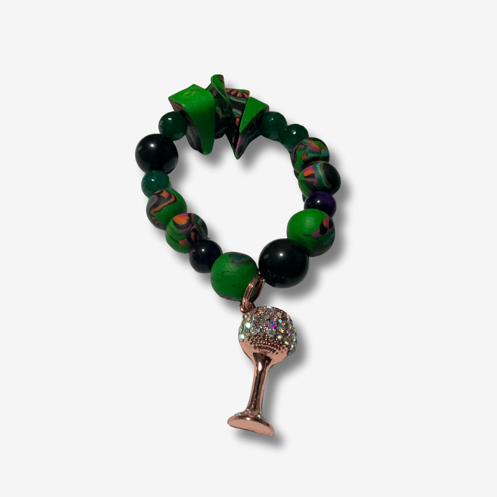 Handcrafted bracelet blending authentic crystals and polymer clay beads, designed for powerful energy and bold style.