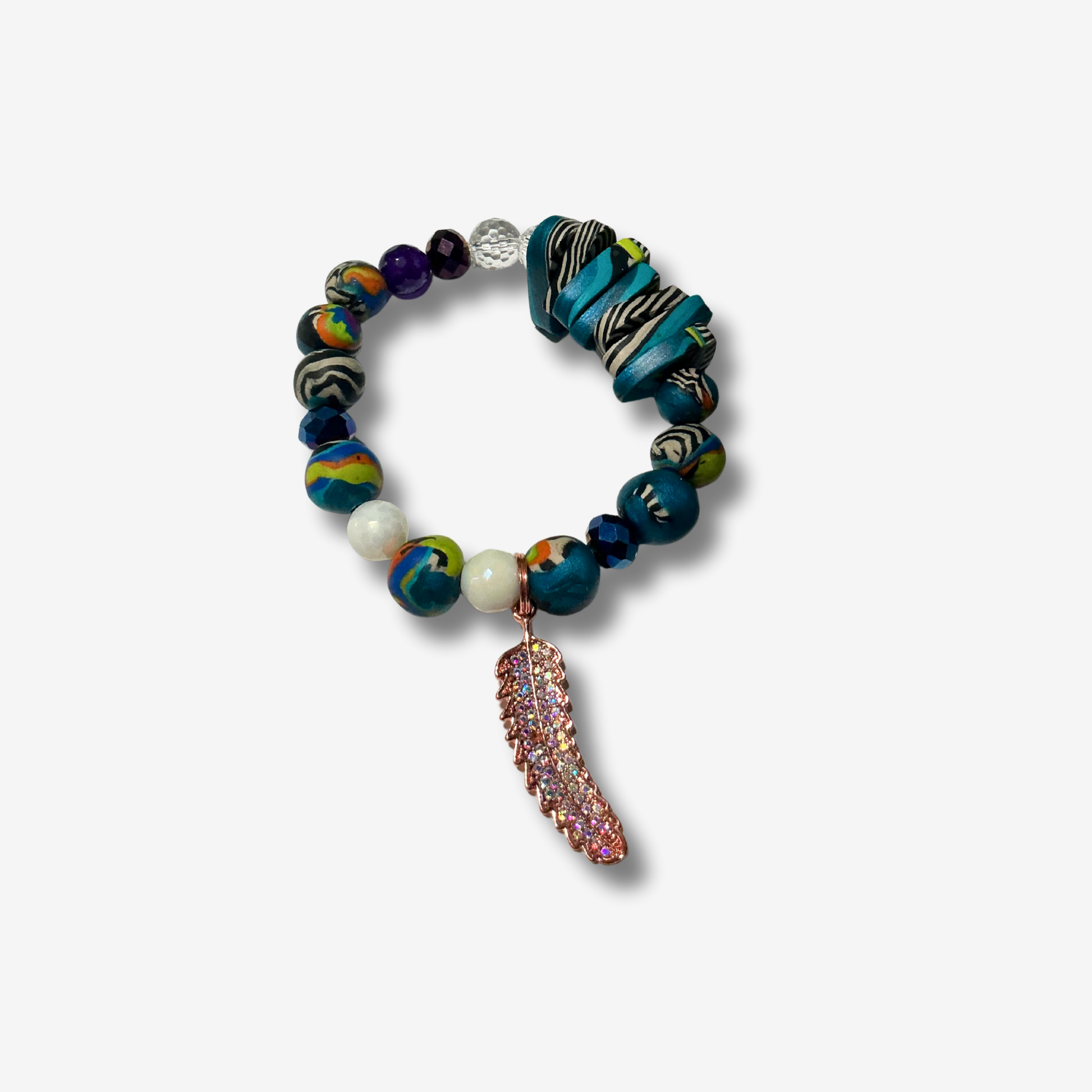 Handcrafted bracelet blending authentic crystals and polymer clay beads, designed for powerful energy and bold style.