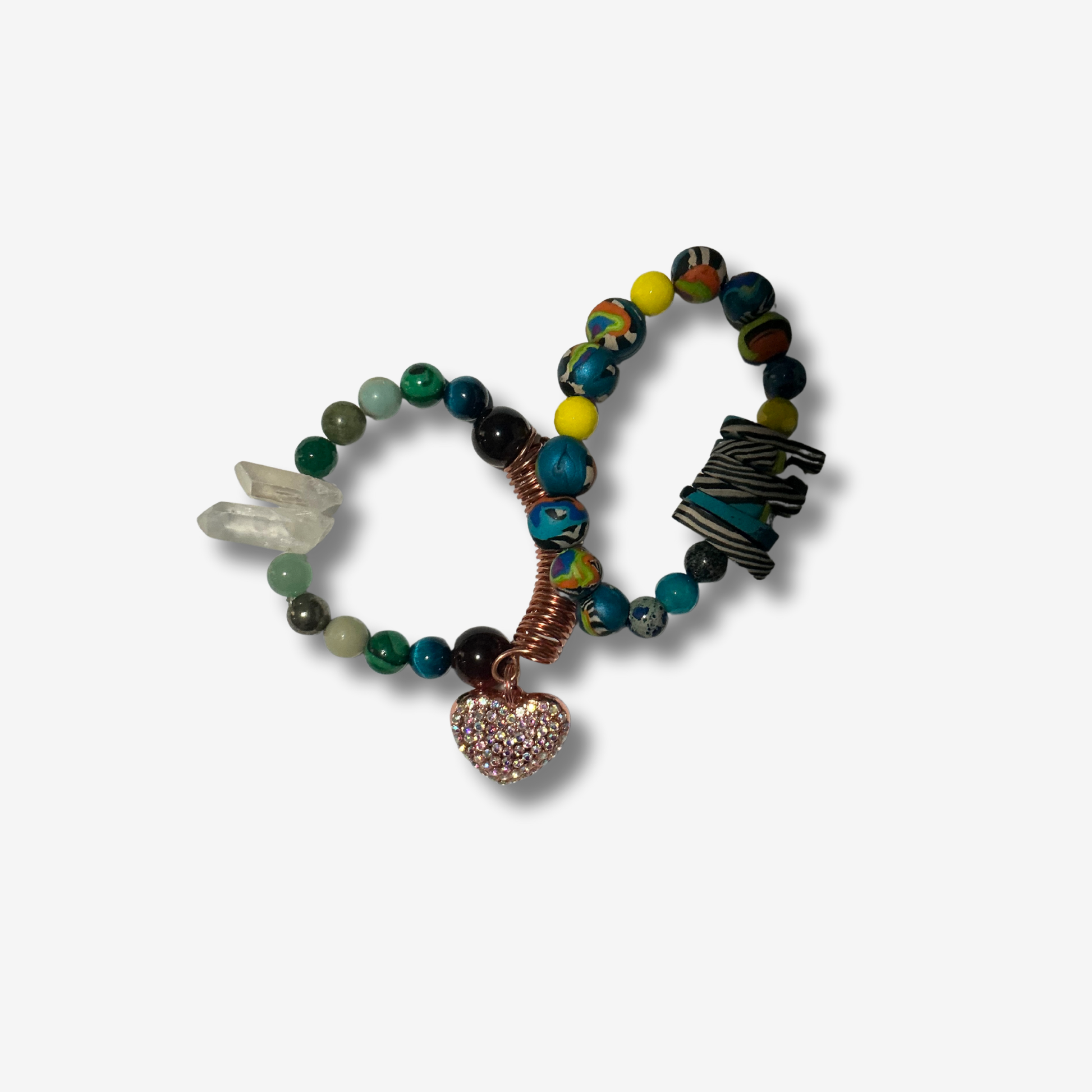 Handcrafted bracelet blending authentic crystals and polymer clay beads, designed for powerful energy and bold style.