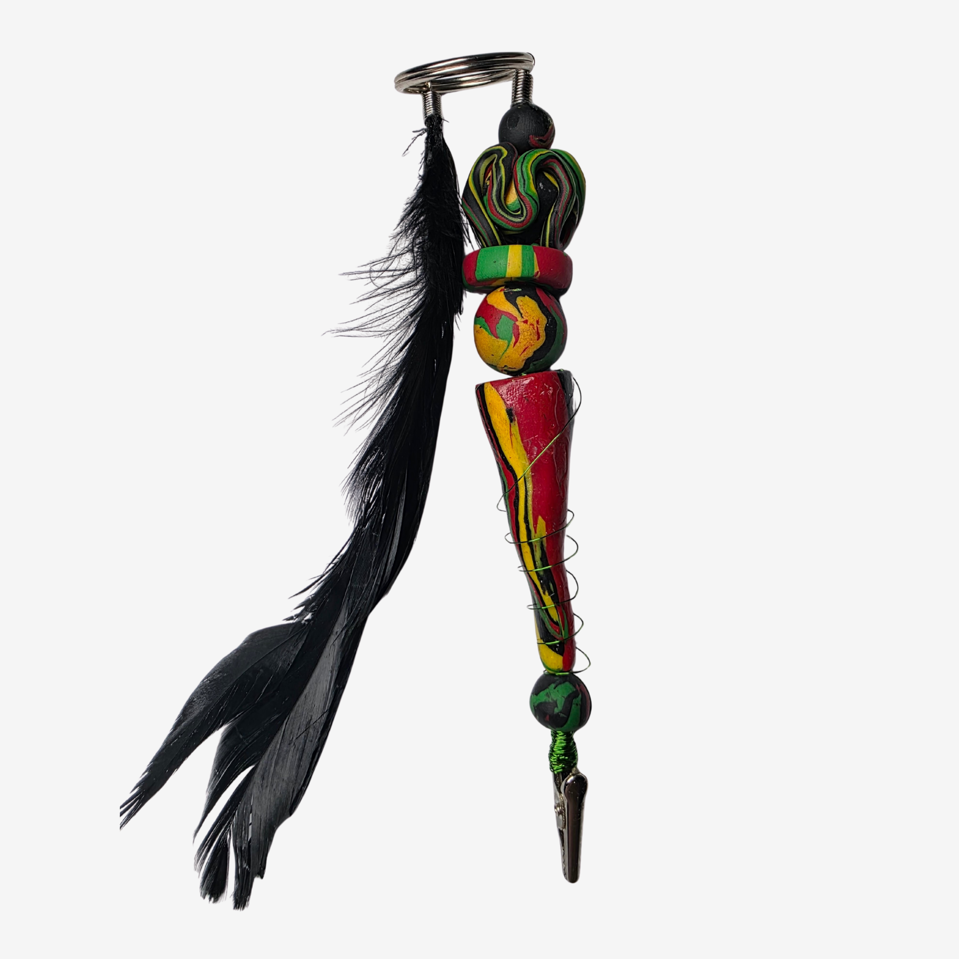 Handmade polymer clay card clips in Pan-African red, green, and black with bold textures and unique designs — functional accessories that celebrate culture and creativity