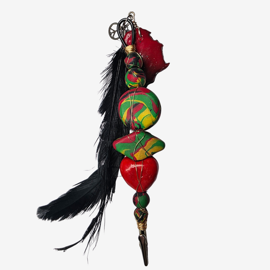 Handmade polymer clay card clips in Pan-African red, green, and black with bold textures and unique designs — functional accessories that celebrate culture and creativity