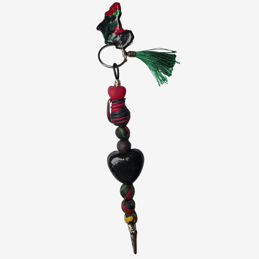 Handmade polymer clay card clips in Pan-African red, green, and black with bold textures and unique designs — functional accessories that celebrate culture and creativity