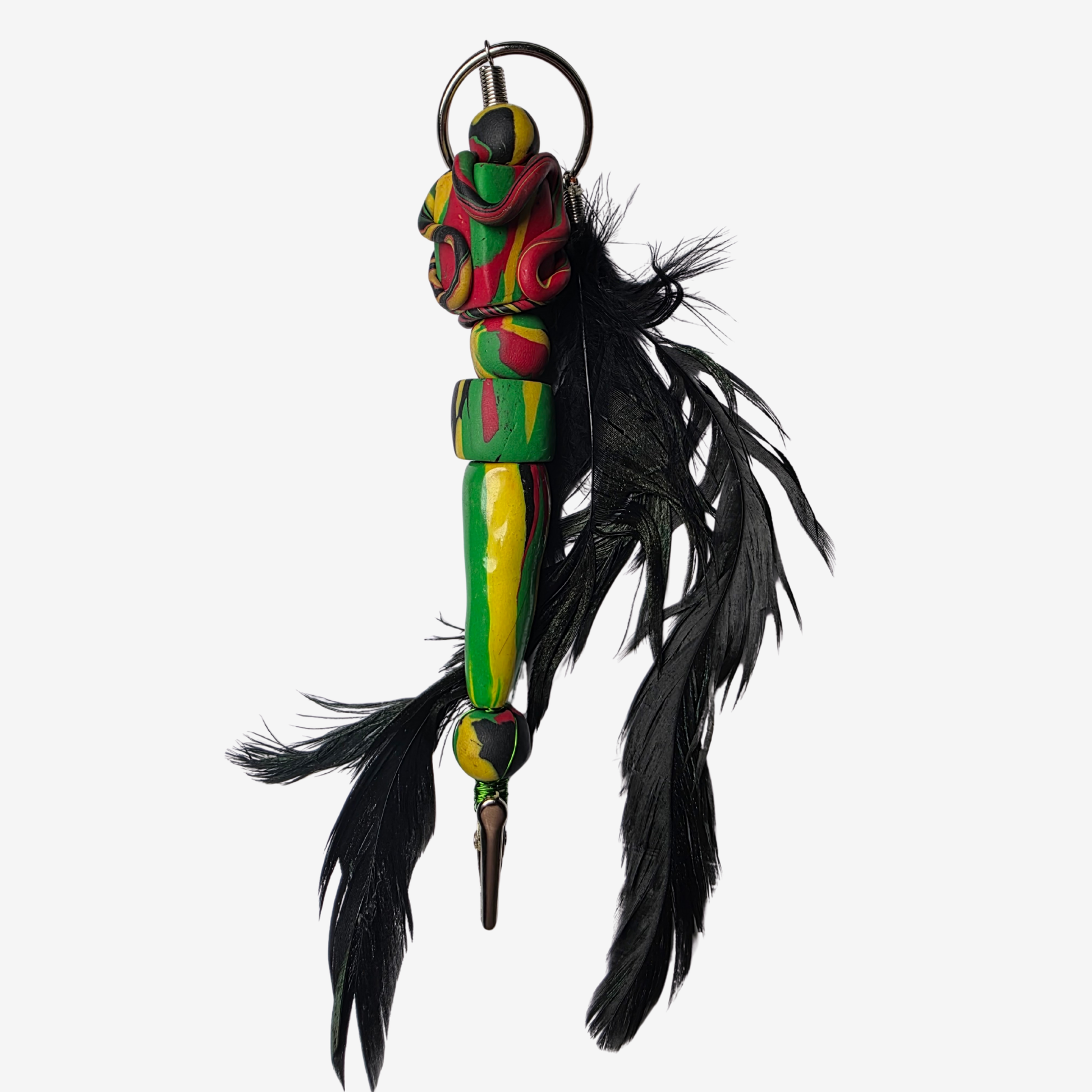 Handmade polymer clay card clips in Pan-African red, green, and black with bold textures and unique designs — functional accessories that celebrate culture and creativity