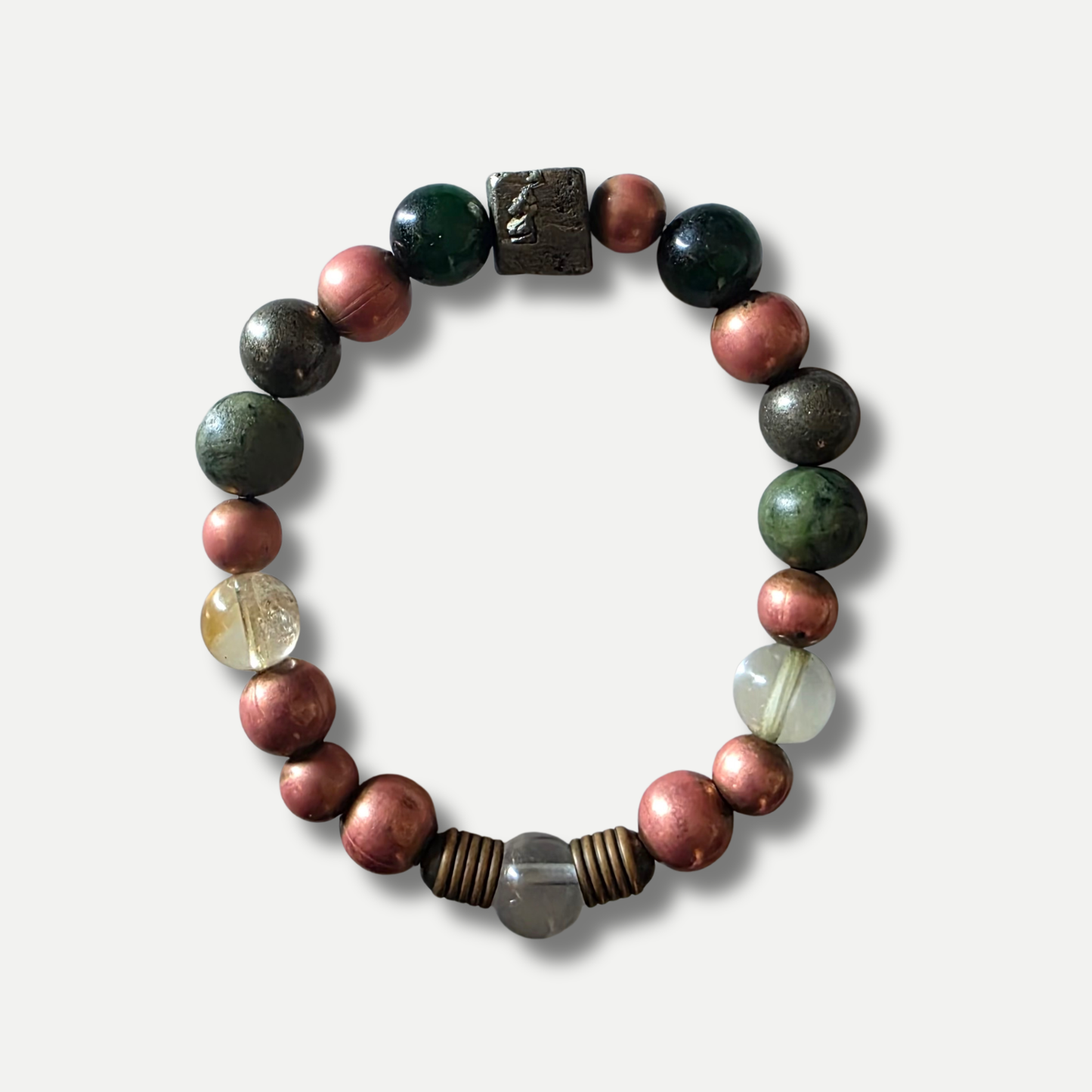 The Midas Touch abundance bracelet with clear quartz peridot and copper