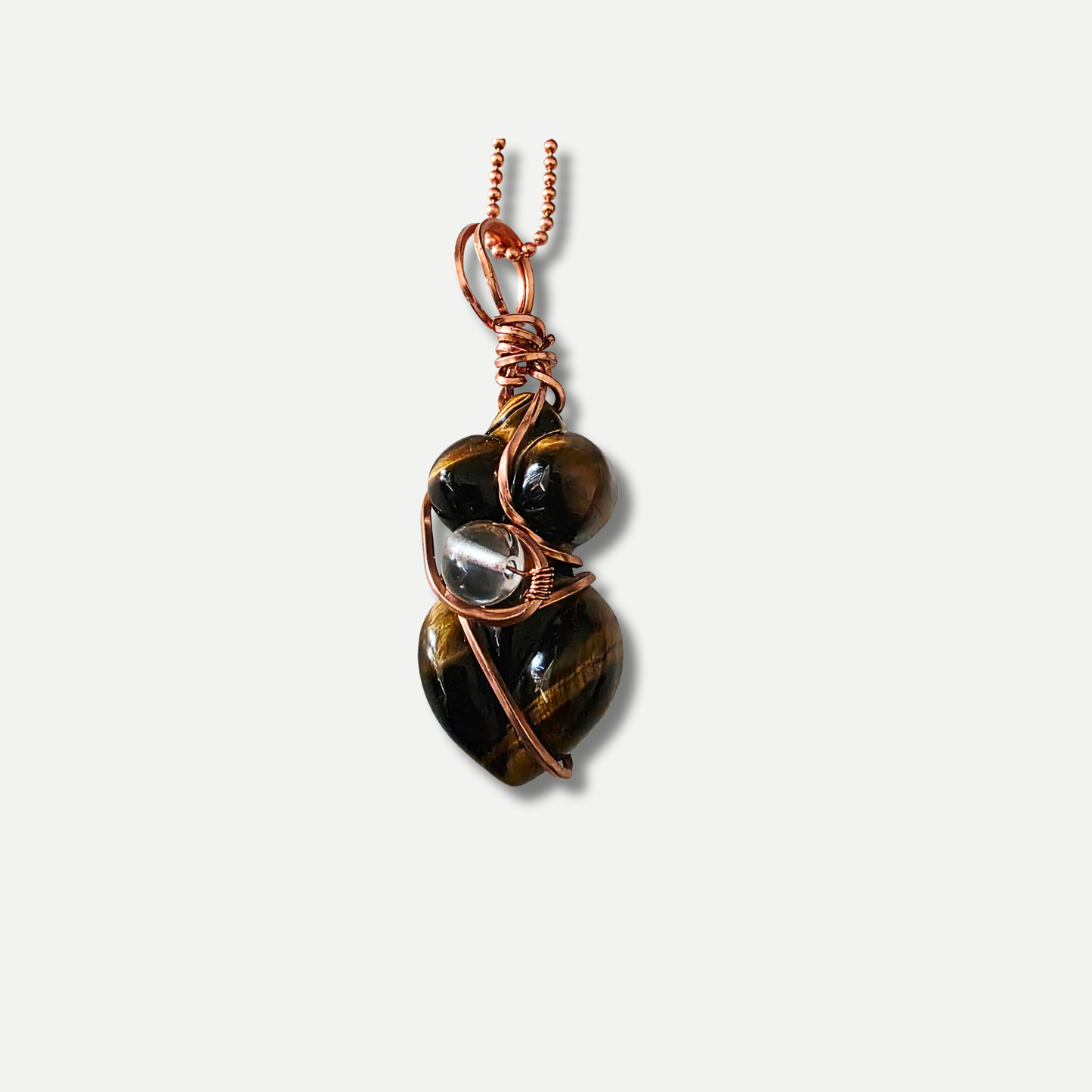 Tiger’s eye pendant necklace with golden brown natural stone – JvOR. Close up view