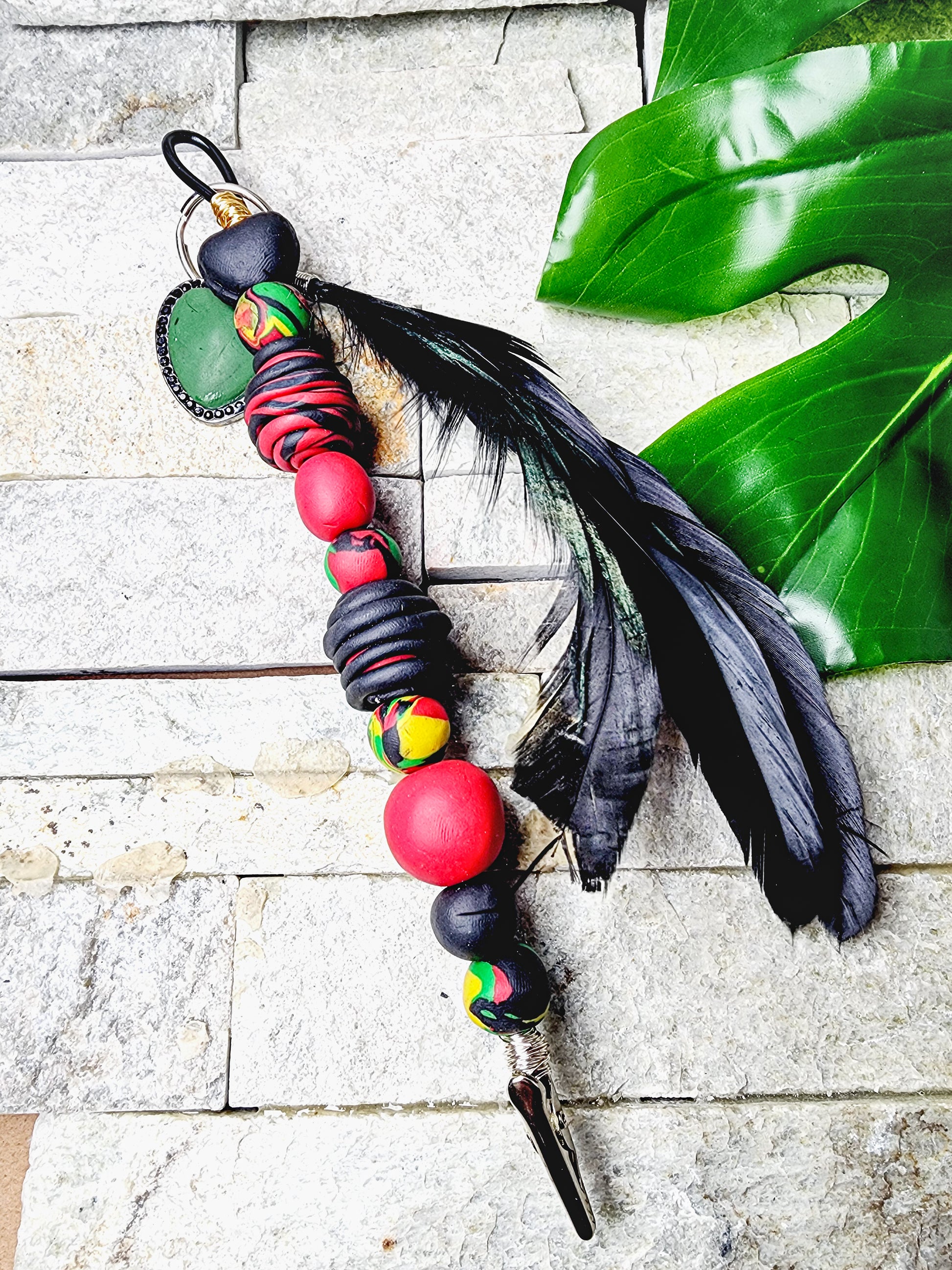 Pan-African inspired card clip with handcrafted polymer clay beads