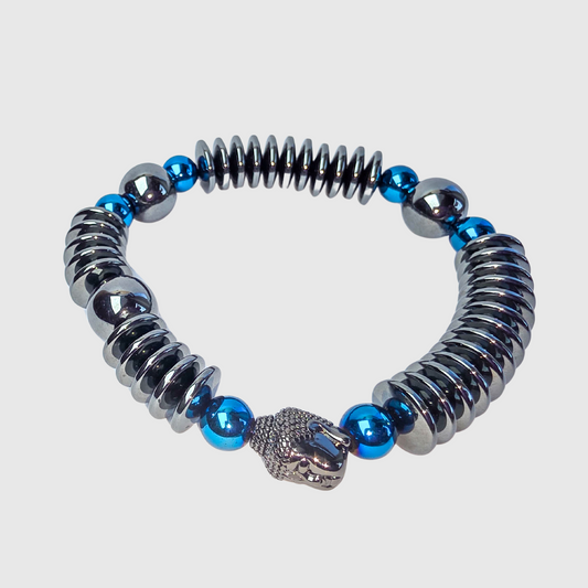 Men’s grounding bracelet with hematite rondelles, deep blue hematite accents, and Buddha centerpiece – strength and clarity jewelry