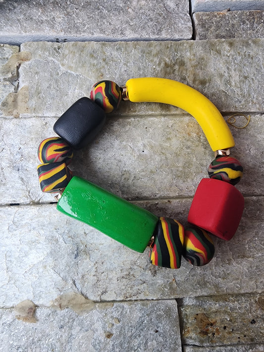 Pan-African clay bracelet with hematite — bold, grounding, and handmade.