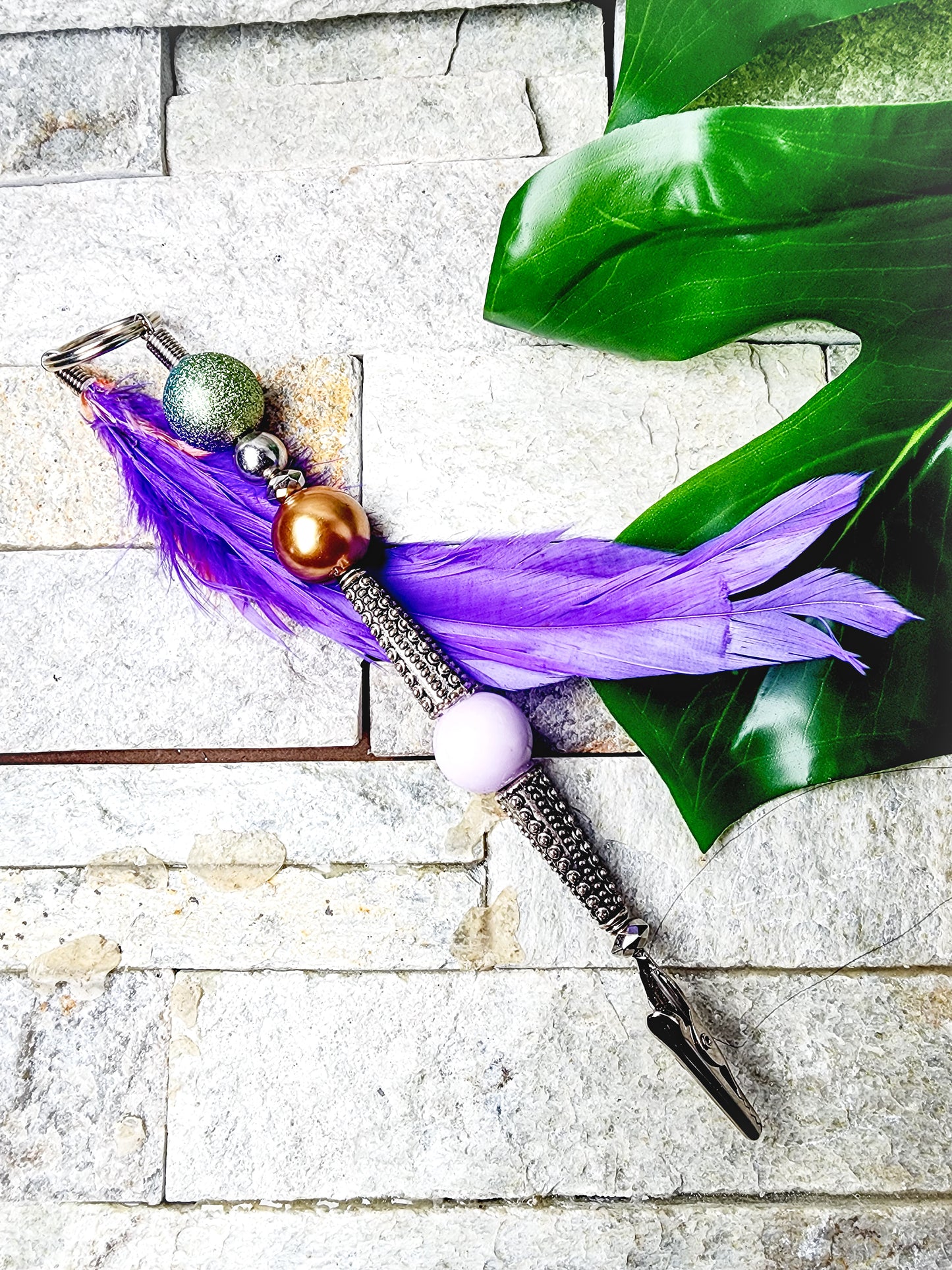 Nixx | Feather-Embellished Weed Clips for Elegant Rituals