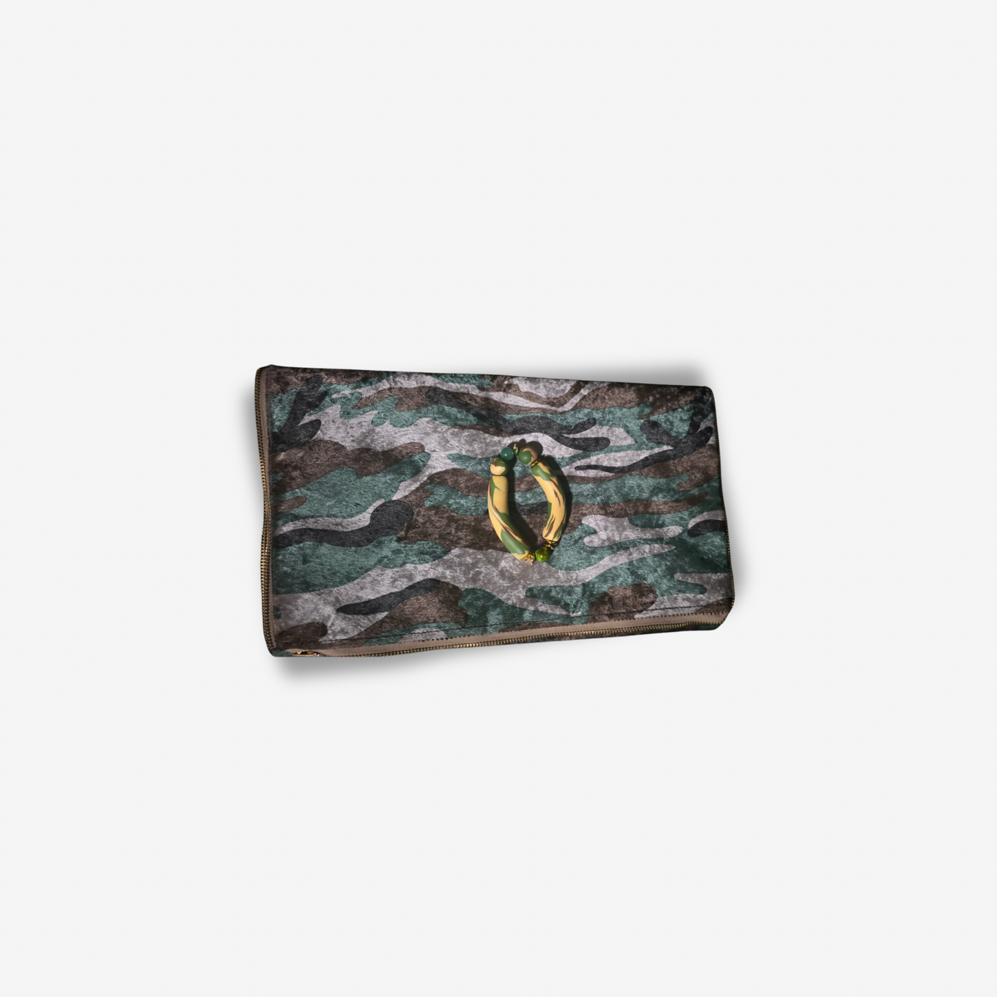 JVOR x Lavish Society Armory Lux camo clutch with handmade camo bracelet on white background”