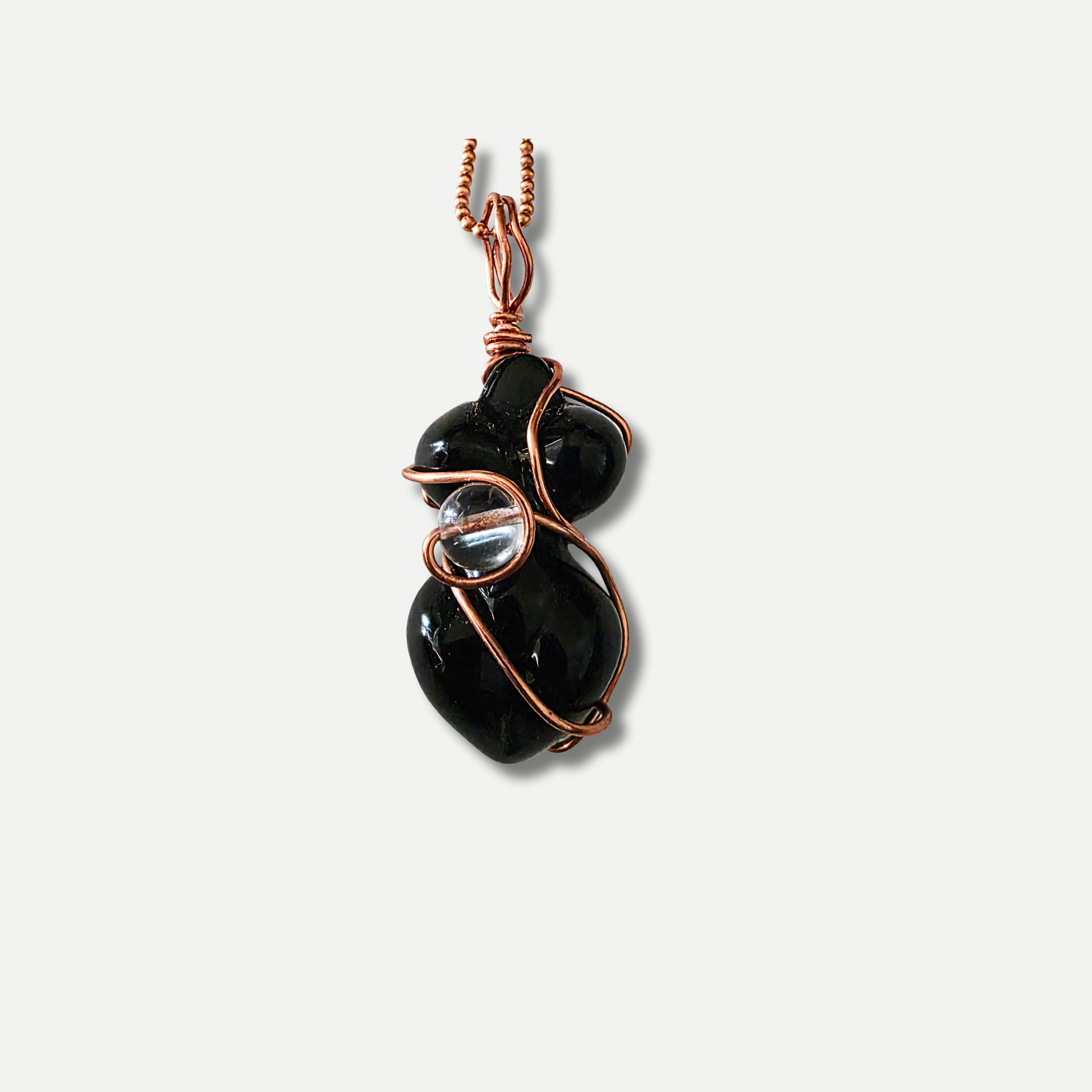 Black agate pendant necklace with deep glossy natural stone – JvOR. Close up view