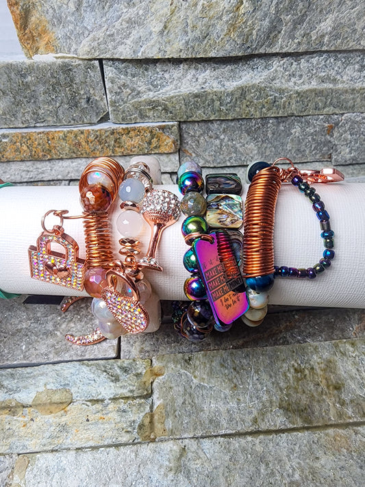 CADENCE BRACELET STACK WITH LUXE COPPER AND CRYSTAL ACCENTS - AN ARTISTIC SYMPHONY OF BALANCE, WEALTH, AND BOLD STYLE.