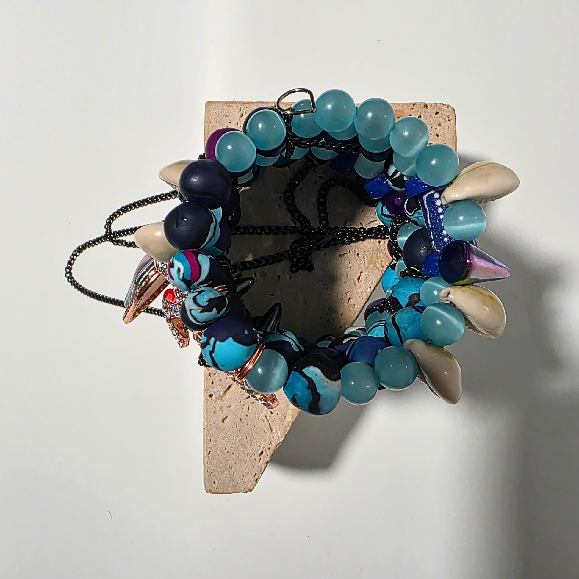 Blue Venom crystal and clay hybrid bracelet for men — grounding and abundance energy piece. OVERHEAD IMAGE