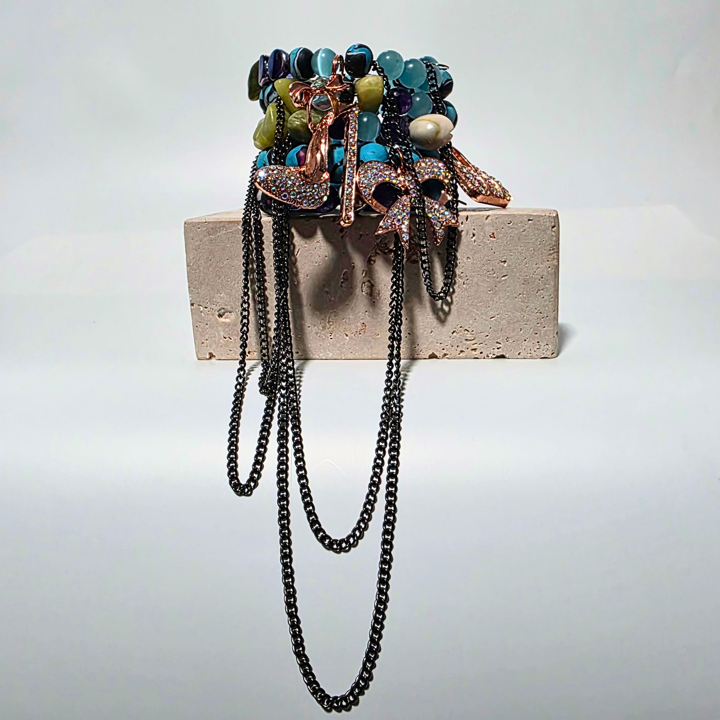 Jasper Rebellion bracelet — blue imperial jasper, purple jade, citrine, and clay beads with cowrie shells and gunmetal chains.