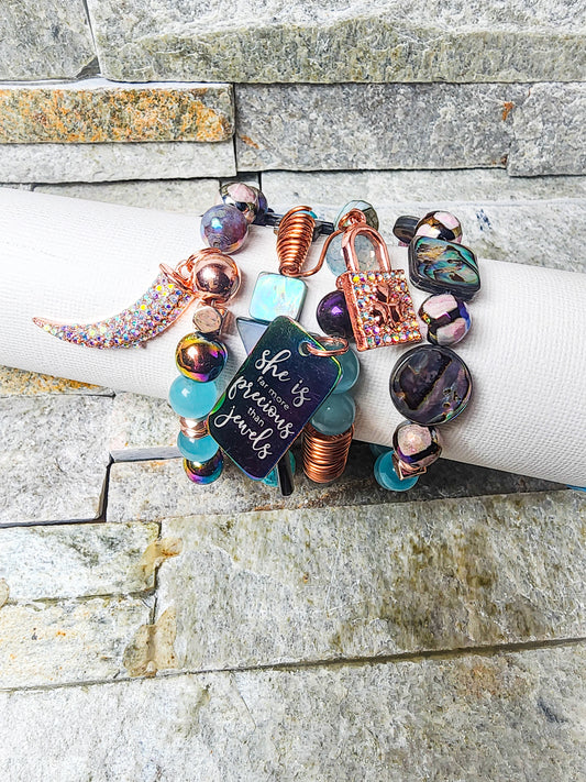 Eye Candy bracelet stack with handcrafted clay beads and vibrant crystals — playful, powerful, and visually captivating arm candy”