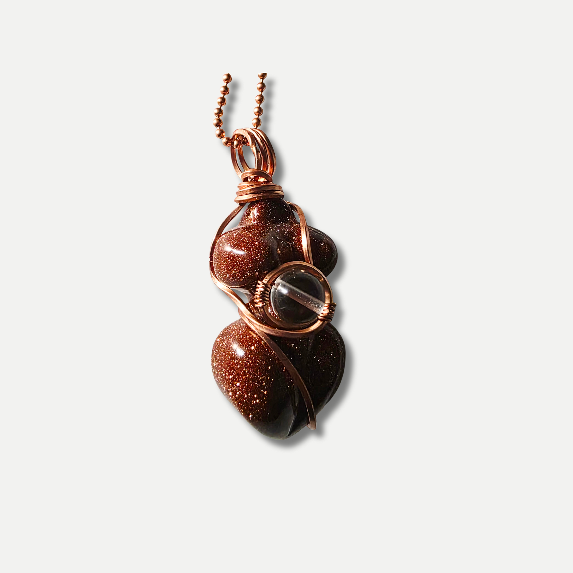 Goldstone pendant necklace with glittering copper flecks – JvOR. Close up view