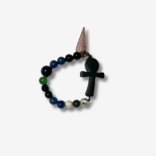 Handcrafted bracelet blending authentic crystals and polymer clay beads, designed for powerful energy and bold style.