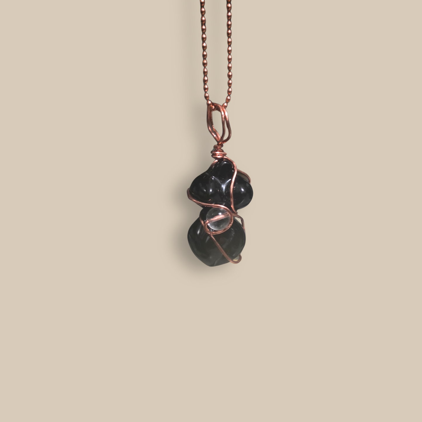 Black Agate copper-wrapped pendant by JvOR — handmade grounding crystal jewelry for protection, stability, and inner strength.