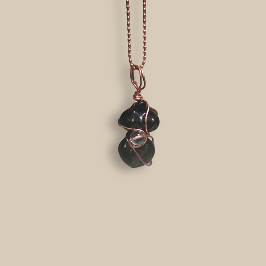 Black Agate copper-wrapped pendant by JvOR — handmade grounding crystal jewelry for protection, stability, and inner strength.