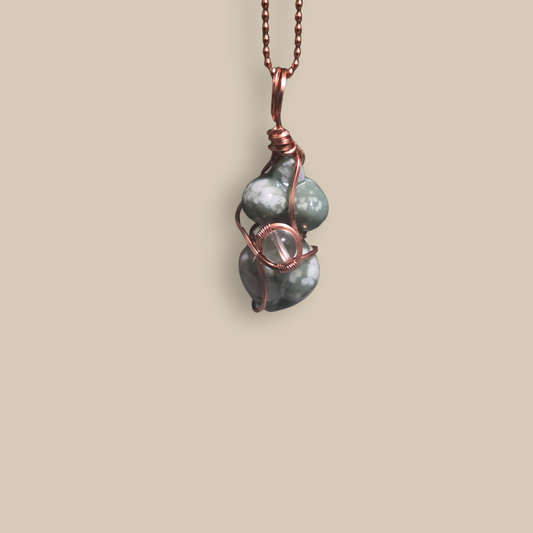 Peace Jade copper-wrapped pendant by JvOR — soothing handmade crystal jewelry for harmony, serenity, and spiritual calm.