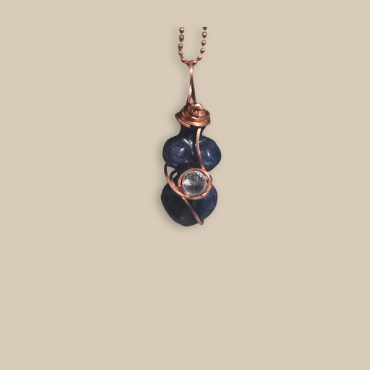 Rainbow Fluorite copper-wrapped pendant by JvOR — handmade healing crystal jewelry for focus, transformation, and aura cleansing.