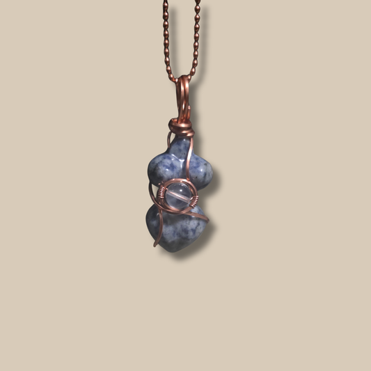 Blue Spot Jasper copper-wrapped pendant by JvOR — calming handmade crystal jewelry for strength, peace, and emotional grounding.