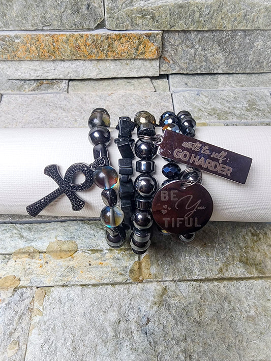 PIVOT BRACELET STACK IN DEEP CHARCOAL TONES WITH MOTIVATIONAL CHARMS - FOR POWERFUL TRANSITIONS AND GROUNDED STRENGTH