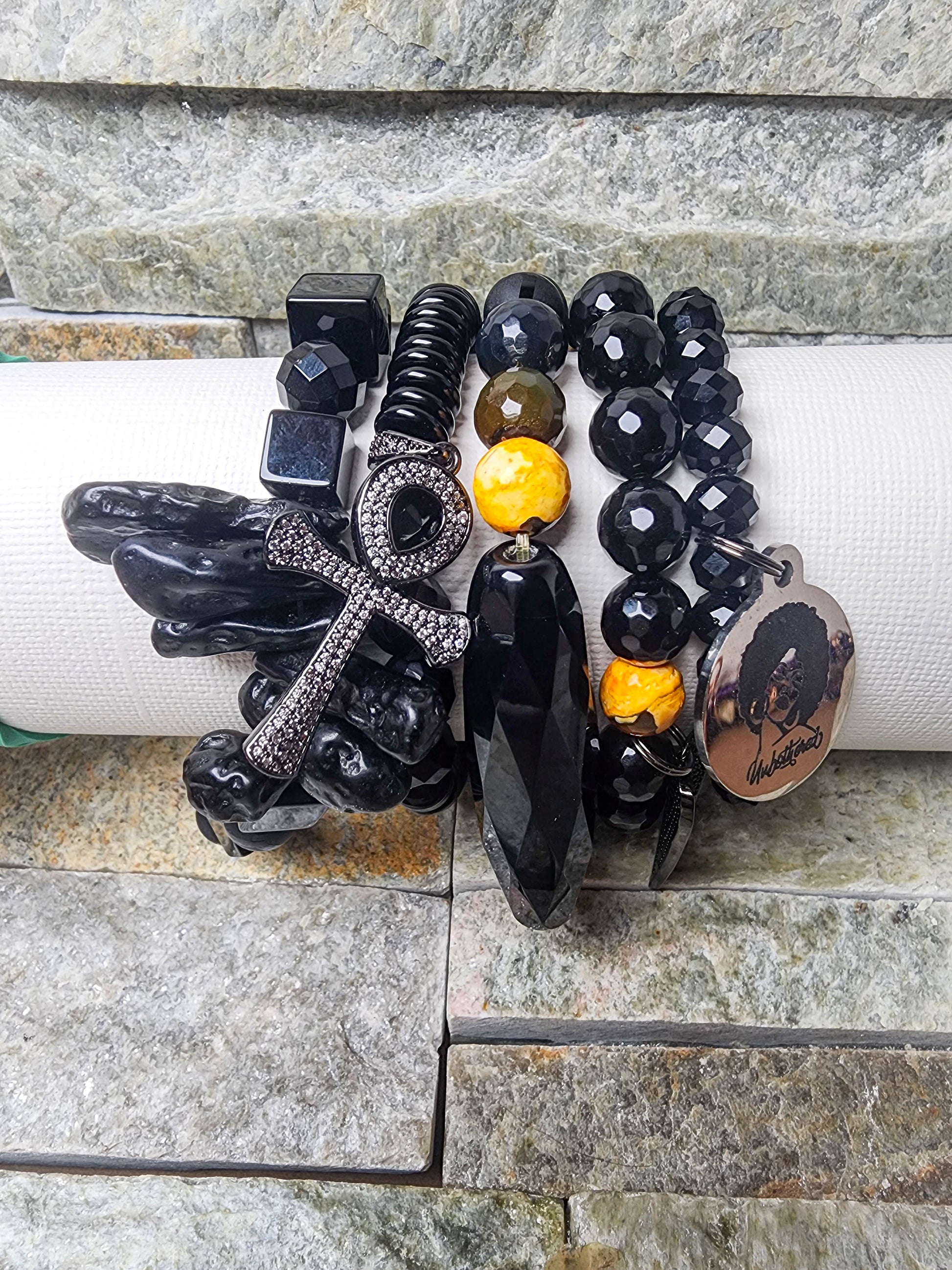 PULSATE EARTH’S SYMPHONY STACK IN BLACK & GOLD - HARMONIZING EARTHLY POWER WITH SOULFUL CRYSTAL FLOW.