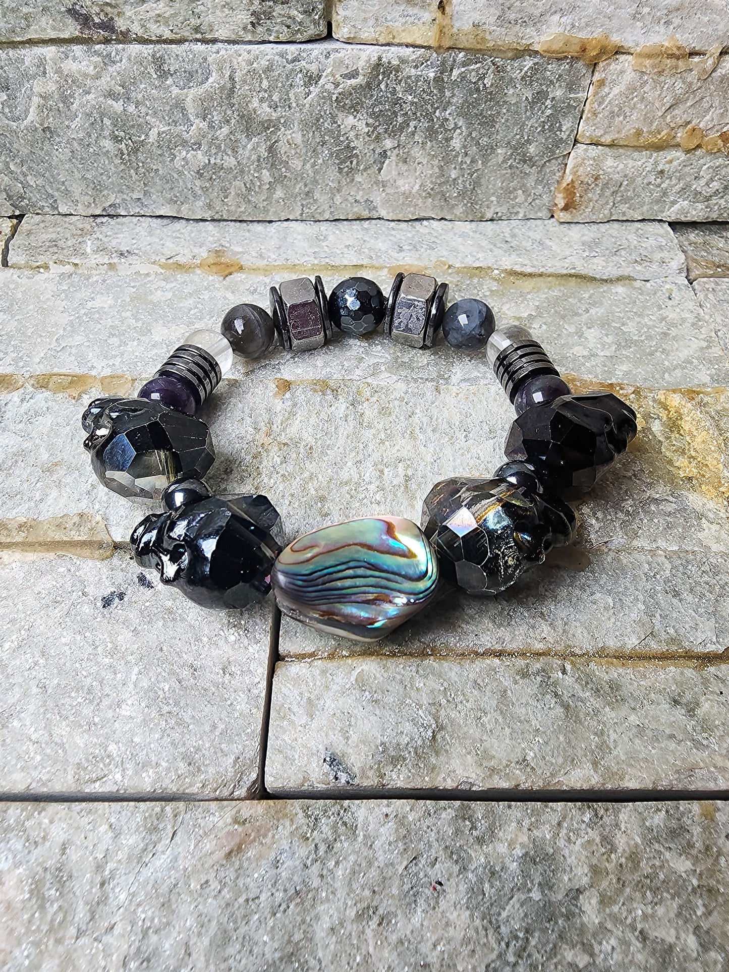 edgy crystal bracelet with skulls and hex nuts for spiritual warriors