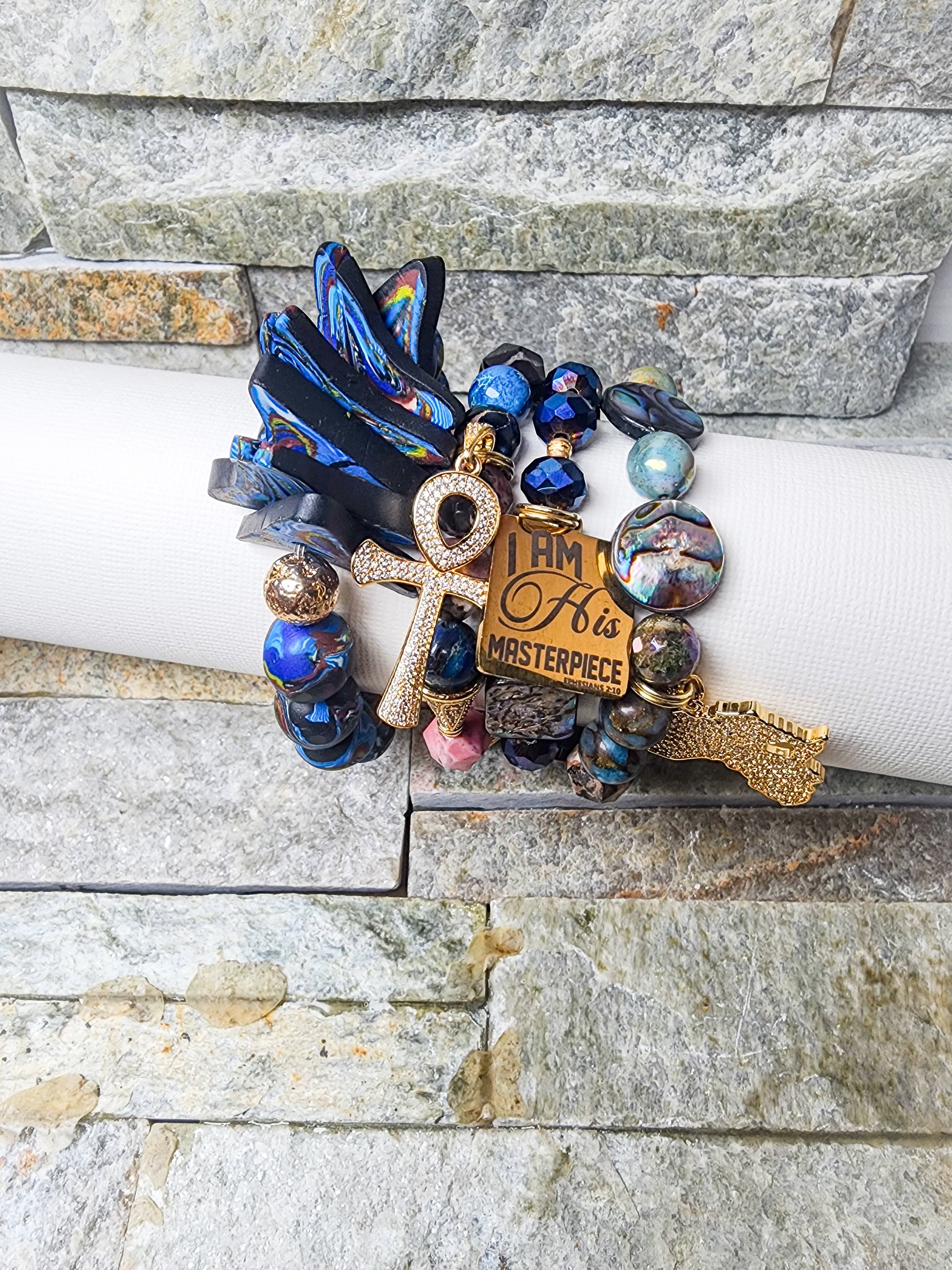 Stacked bracelet sets featuring handcrafted polymer clay beads, crystal accents, and powerful charms — a bold fusion of art, energy, and affirmation”