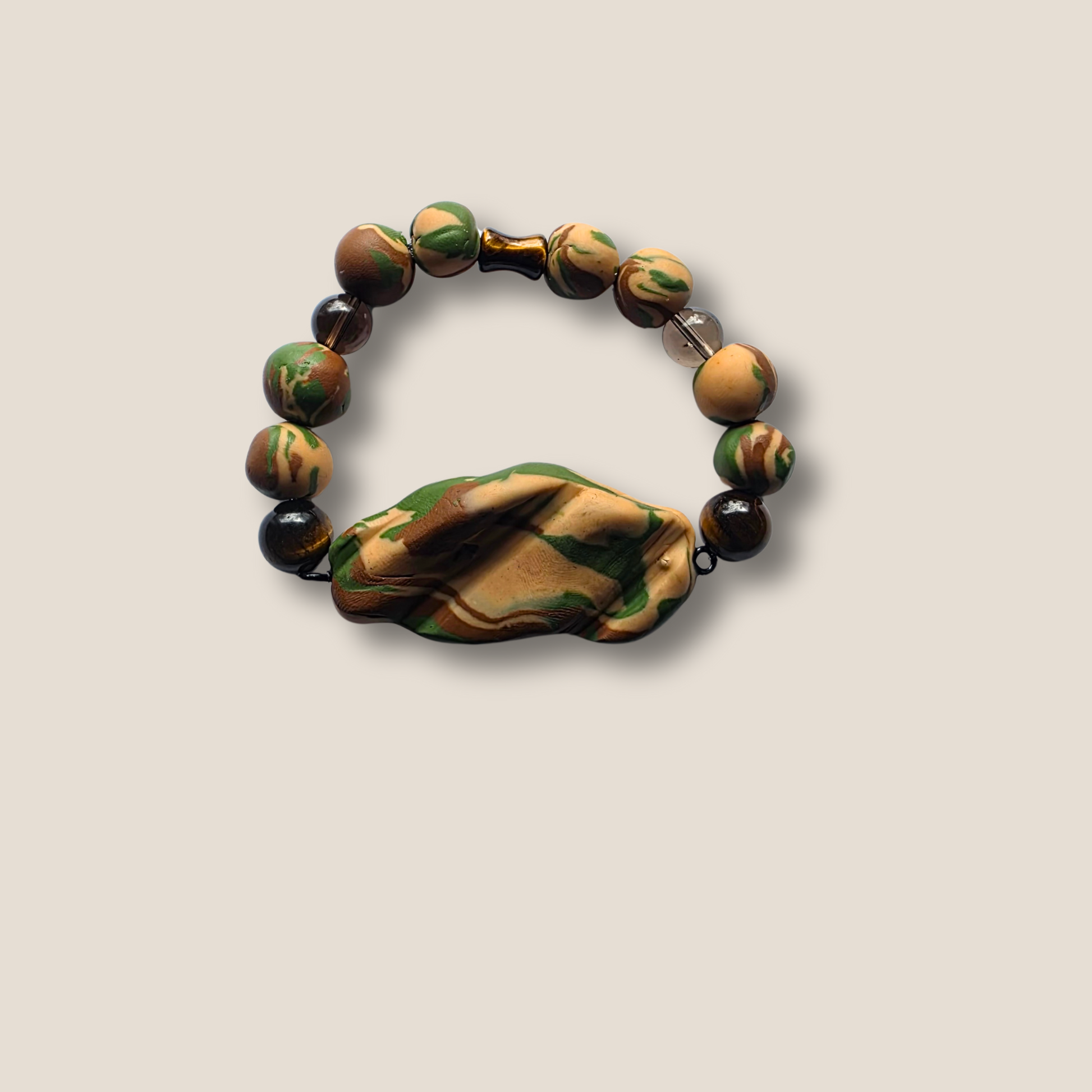 JvOR Smoke Signal camo polymer clay bracelet with Tiger’s Eye and Smoky Quartz — unisex handmade grounding and protection jewelry.