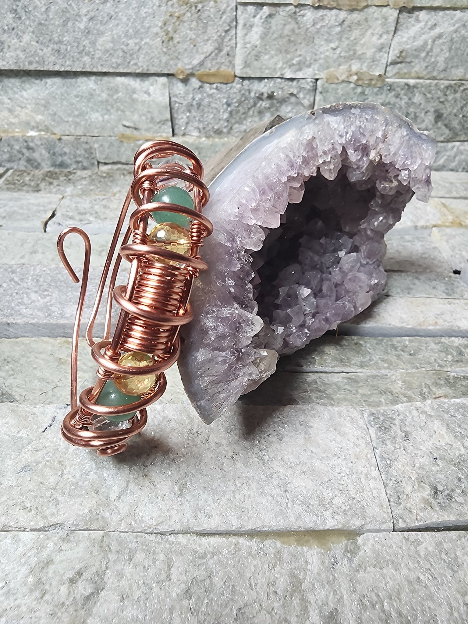 The Midas Touch copper wire-wrapped bracelet with Pyrite, Citrine, Green Aventurine, and Clear Quartz for abundance, manifestation, and prosperity energy.