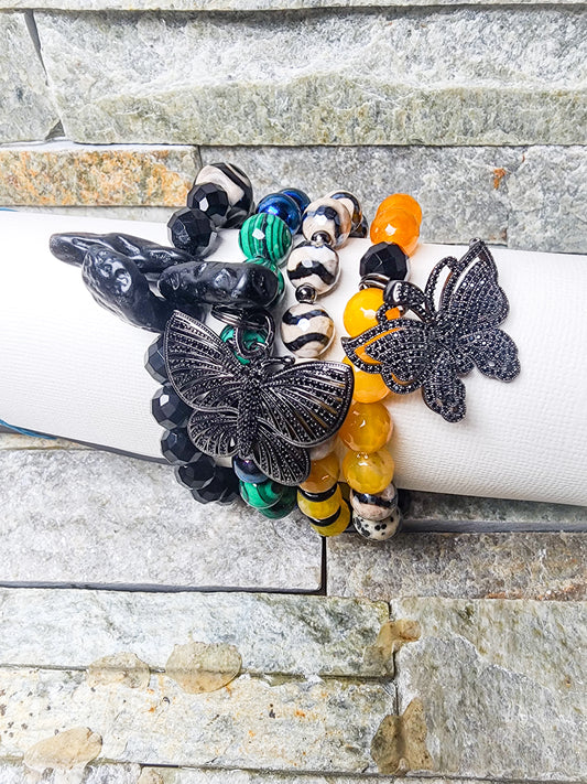 VIVACIOUS MULTICOLORED BRACELET STACK WITH BUTTERFLY CHARM - BOLD, EXPRESSIVE, & BURSTING WITH PERSONALITY.