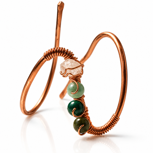 JvOR Aje handmade copper prosperity cuff with green crystals, front view